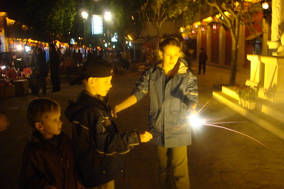 lighting sparklers in old town Dali