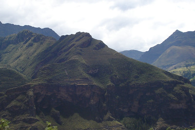 Inca terrace walls are visible high on this mountain