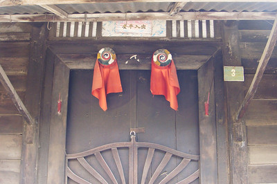 some door fames have "eyes" to keep out evil spirits