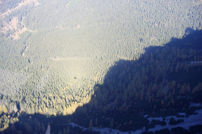 that little speck in the sunlight is our shadow