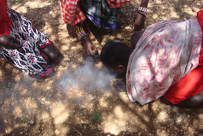 then showed us how to make fire with a couple of sticks