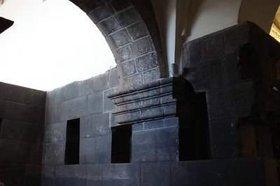 a blending of an Incan wall and a Colonial arch