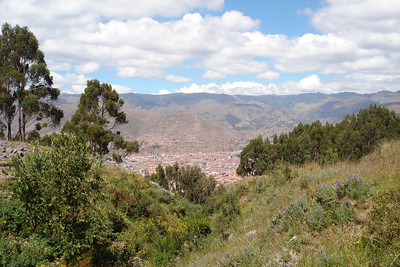 a view of Cusco in the valley below