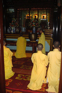 some young monks were worshipping at the temple
