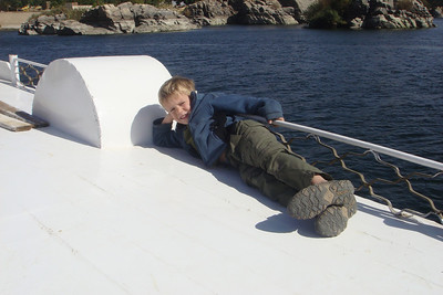 Benji relaxing on the roof of the boat