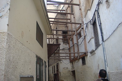 much of the medina is being restored, scaffolding holds these walls up