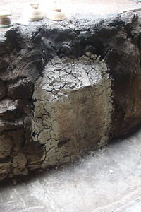 the opening to the kiln closed with clay