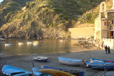 the sun setting over the little beach