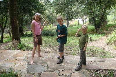showing off their homemade Masai spears