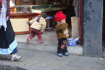 some little faces in the street