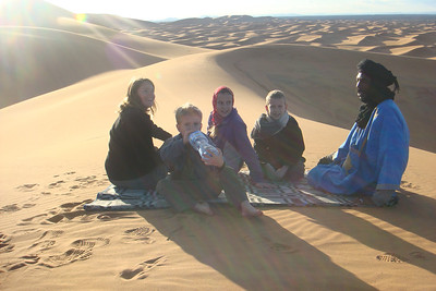 a quick water break before the kids hit the dunes again