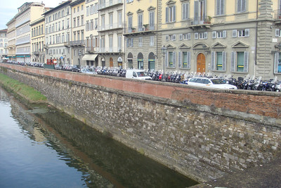 hundreds of motorcycles lining the streets of Florence