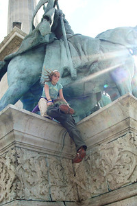 climbing the monument in Heroes' Square