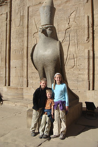 the god Horus standing guard outside the temple