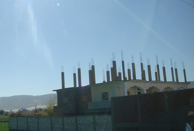 most of the houses we saw had columns and rebar ready for when they could build another level