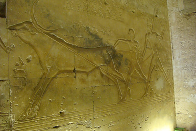Pharaoh Seti showing his son Ramses II how to wrestle a bull