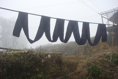 the Black H'mong people are known for their indigo clothes and handicrafts