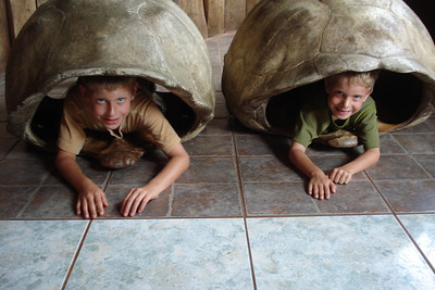 posing in some giant tortoise shells