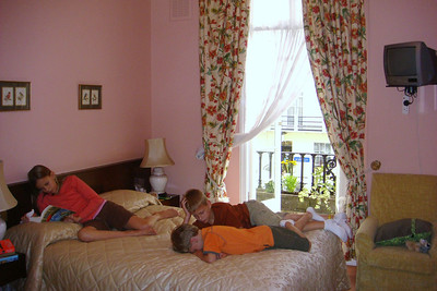 relaxing in our hotel room (Benji is listening to a book on tape)