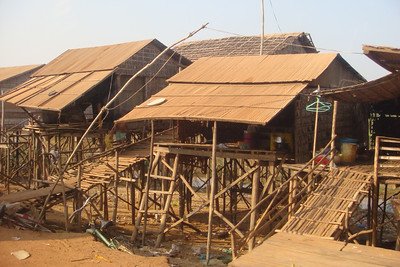 people with no land build houses over the lake
