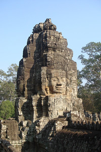 these giant Buddha heads were added later when Buddhism replaced Hinduism