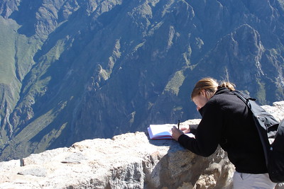 Meredith taking notes for her journal and stories