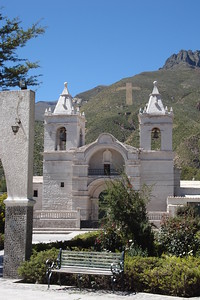 a cross on a mountain in Chivay