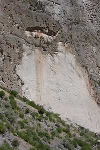 a pre-Incan tomb high up on a cliff face