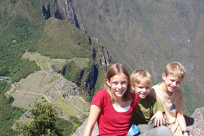 posing at the very top of Waynu Picchu