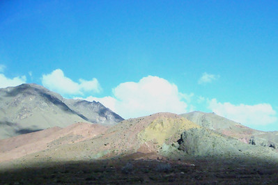 red, yellow and green soil on the same hill