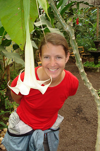 Meredith posing with a big hanging bell flower