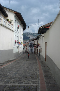 strolling down a quiet Quito street