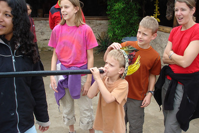 the kids blowing darts...