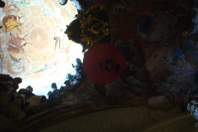 one of the bishop's hats hanging from the ceiling