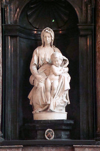 a Maddona and Child by Michelangelo is in the Church of Our Lady