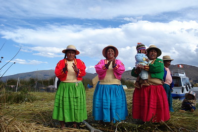 some village women singing as the boat pulled away