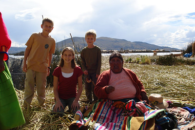 the kids posing with a villager