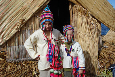 the boys looking tough in their colorful hats and scarves, well as tough as they can
