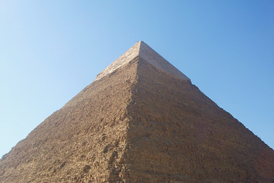the polished limestone covering is still intact on the top of the pyramid of Chephren