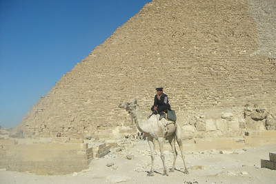 a police officer enjoying a cigarette on his camel