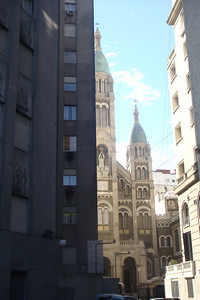 the Kavanagh building obscuring a little church