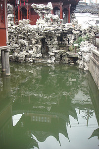 the four elements of a Chinese Garden: rocks, bonsai, water and Chinese architecture