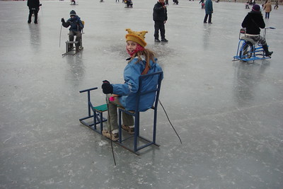 sliding on the ice on a chair welded to a sled