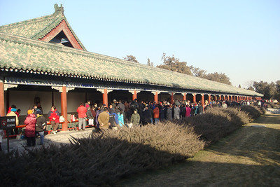 the Temple of Heaven was crowded with people singing and playing games