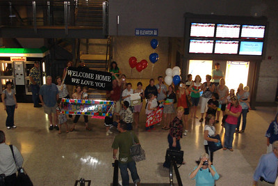 the entire welcoming party as we came down the escalator