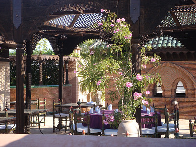 the rooftop terrace seemed miles away from the market below