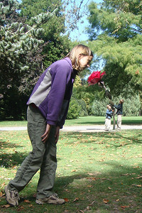 the Lilliputian boys presenting a flower to Alayna